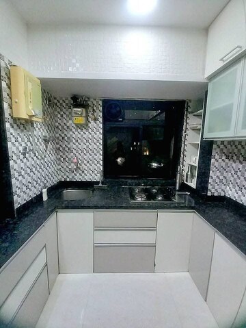 Kitchen in 2 BHK Apartment at Ashok Avenue Marol, Marol – for Rent