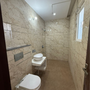 Bathroom in 3 BHK Builder Floor at Dhakoli – for Sale