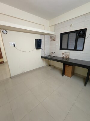 Kitchen in 1 BHK Apartment at Wadgaon Sheri – for Rent