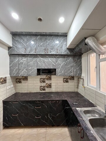 Kitchen in 2 BHK Apartment at Gaur City 7th Avenue, Sector 4 Greater Noida – for Rent