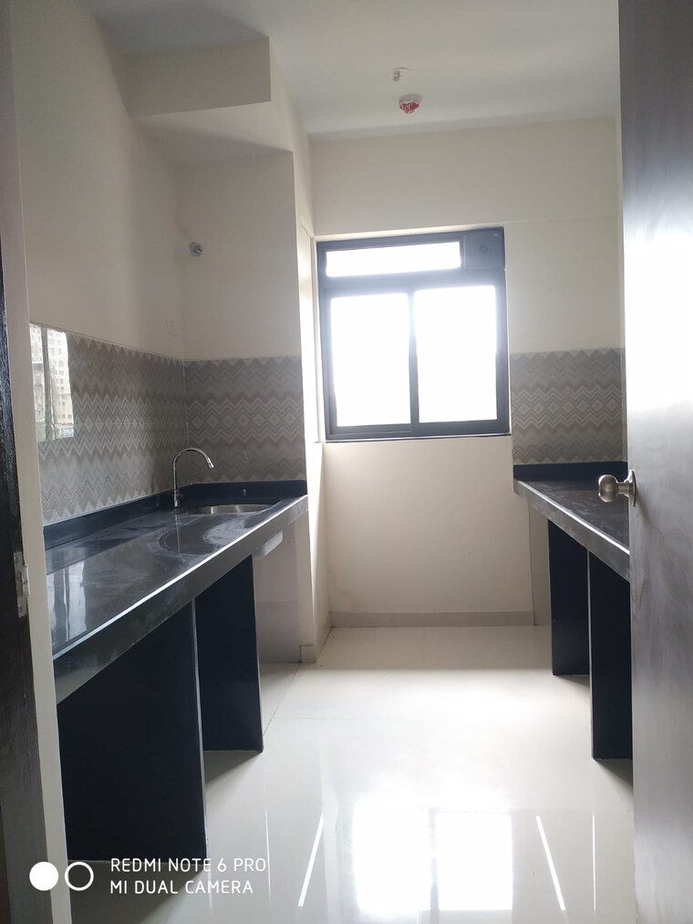 Kitchen, lodha-casa-maxima 2 Bedroom 709 Sq.Ft. Apartment In Mira Road Thane 9533080