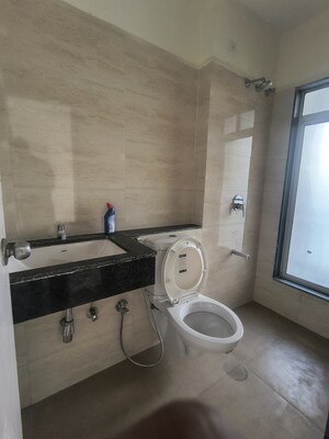 Bathroom in 1.5 BHK Apartment at Indiabulls Greens, New Panvel – for Rent