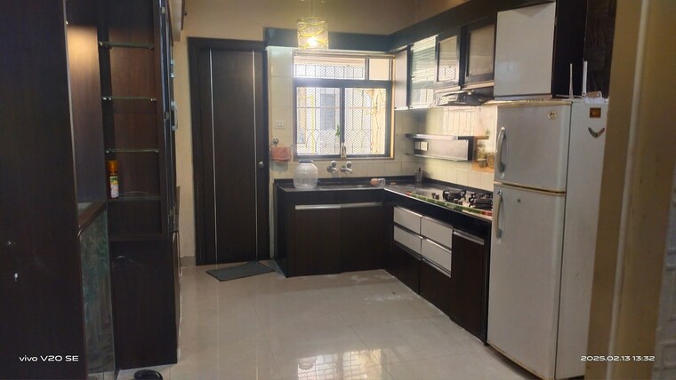 Kitchen, magarpatta-city-cosmos 2 Bedroom 980 Sq.Ft. Apartment In Magarpatta Road Pune 9533400