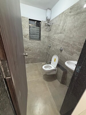 Bathroom in 2 BHK Apartment at Mohini Zen Vrindavan, Dahisar East – for Rent