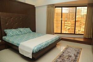 Bedroom in 3 BHK Apartment at Dheeraj Gaurav Heights, Jogeshwari West – for Rent