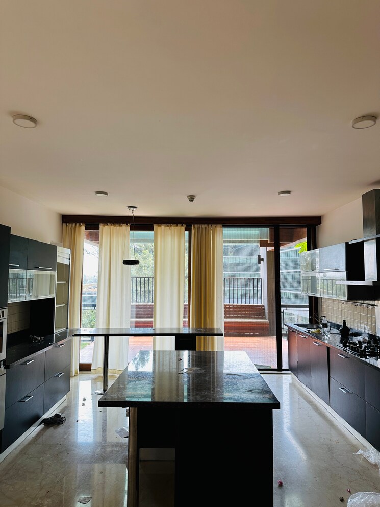 Kitchen, windmills-of-your-mind 4 Bedroom 5129 Sq.Ft. Villa In Whitefield Bangalore 9533550