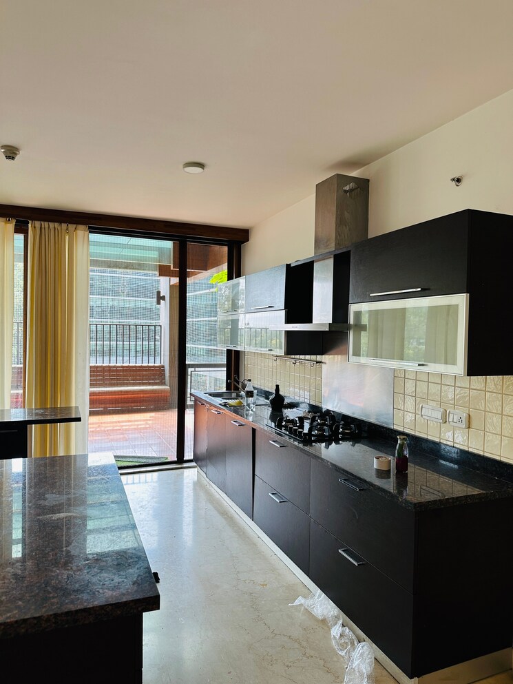 Kitchen, windmills-of-your-mind 4 Bedroom 5129 Sq.Ft. Villa In Whitefield Bangalore 9533550
