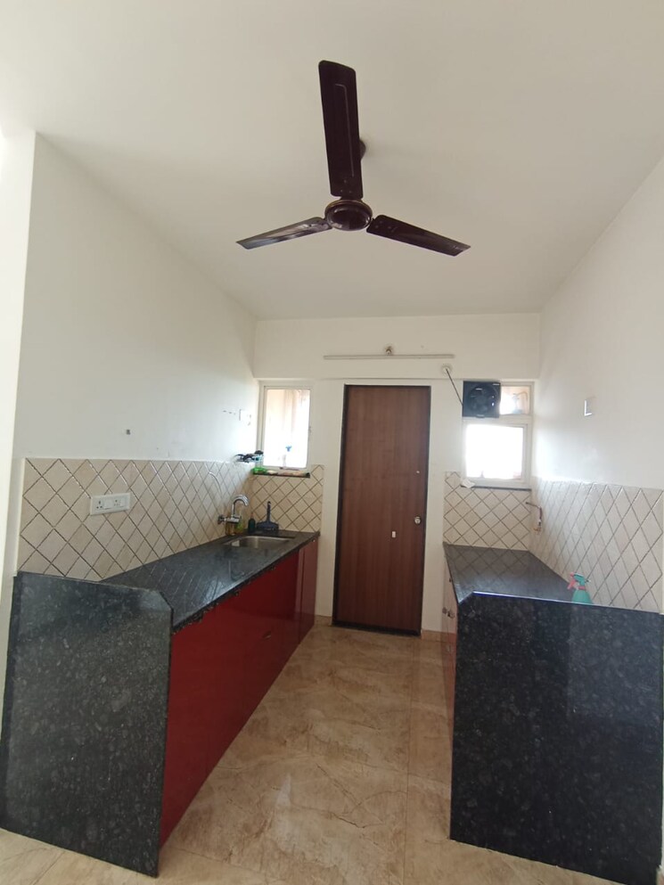 Kitchen, rigved-uptown 2 Bedroom 719 Sq.Ft. Apartment In Balewadi Pune 9533646