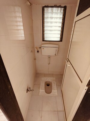 Bathroom in 1 BHK Apartment at Shri Kambeshwar Heights, Morya Nagar – for Sale