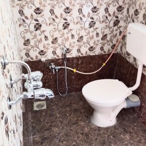Bathroom in 1 BHK Apartment at Mukti Shantinath Tower, Virar West – for Rent