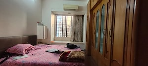 Bedroom in 2 BHK Apartment at Prakriti Towers, Goregaon East – for Rent