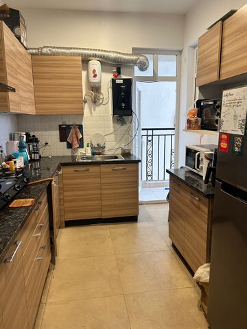 Kitchen in 3 BHK Apartment at ATS Marigold, Sector 89a – for Rent