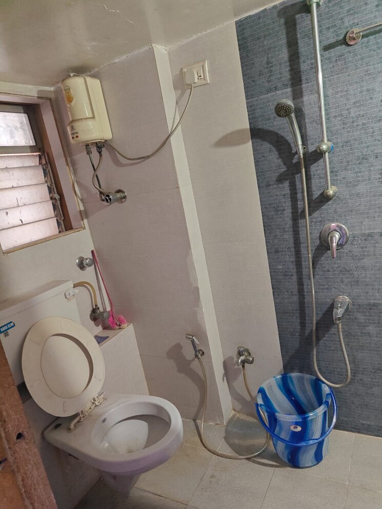 Bathroom, sandstone-chs-ltd 2 Bedroom 880 Sq.Ft. Apartment In Mira Road Thane 9533792