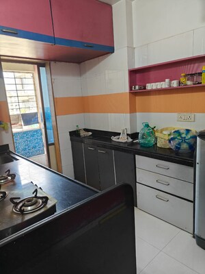Kitchen in 2 BHK Apartment at Sandstone CHS Ltd, Mira Road – for Rent