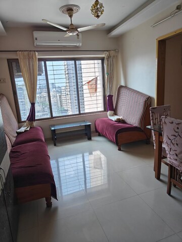 Living Room in 2 BHK Apartment at Sandstone CHS Ltd, Mira Road – for Rent