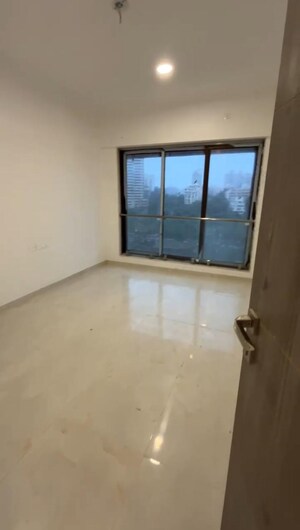 Room in 2 BHK Apartment at IM Applaud 38, Goregaon East – for Rent