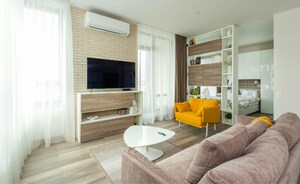 Living Room in 1 BHK Apartment at Yashodhara CHS, Goregaon East – for Rent