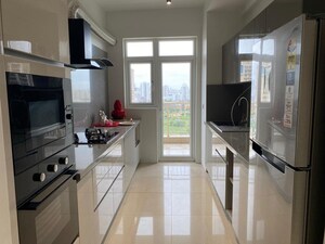 Kitchen in 3 BHK Apartment at Emaar Palm Gardens, Sector 83 – for Sale