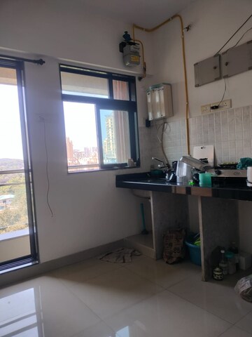 Kitchen in Studio Apartment at Haware Dahlia, Kasarvadavali – for Rent