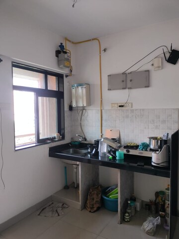 Kitchen in Studio Apartment at Haware Dahlia, Kasarvadavali – for Rent