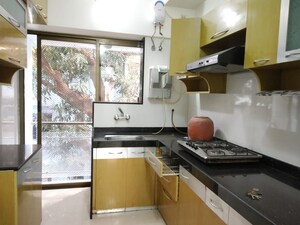 Kitchen in 3 BHK Apartment at Ashmita Apartments, Khar West – for Sale