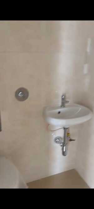 Bathroom in 1 BHK Apartment at BG Shirke Monte Verita, Borivali East – for Rent