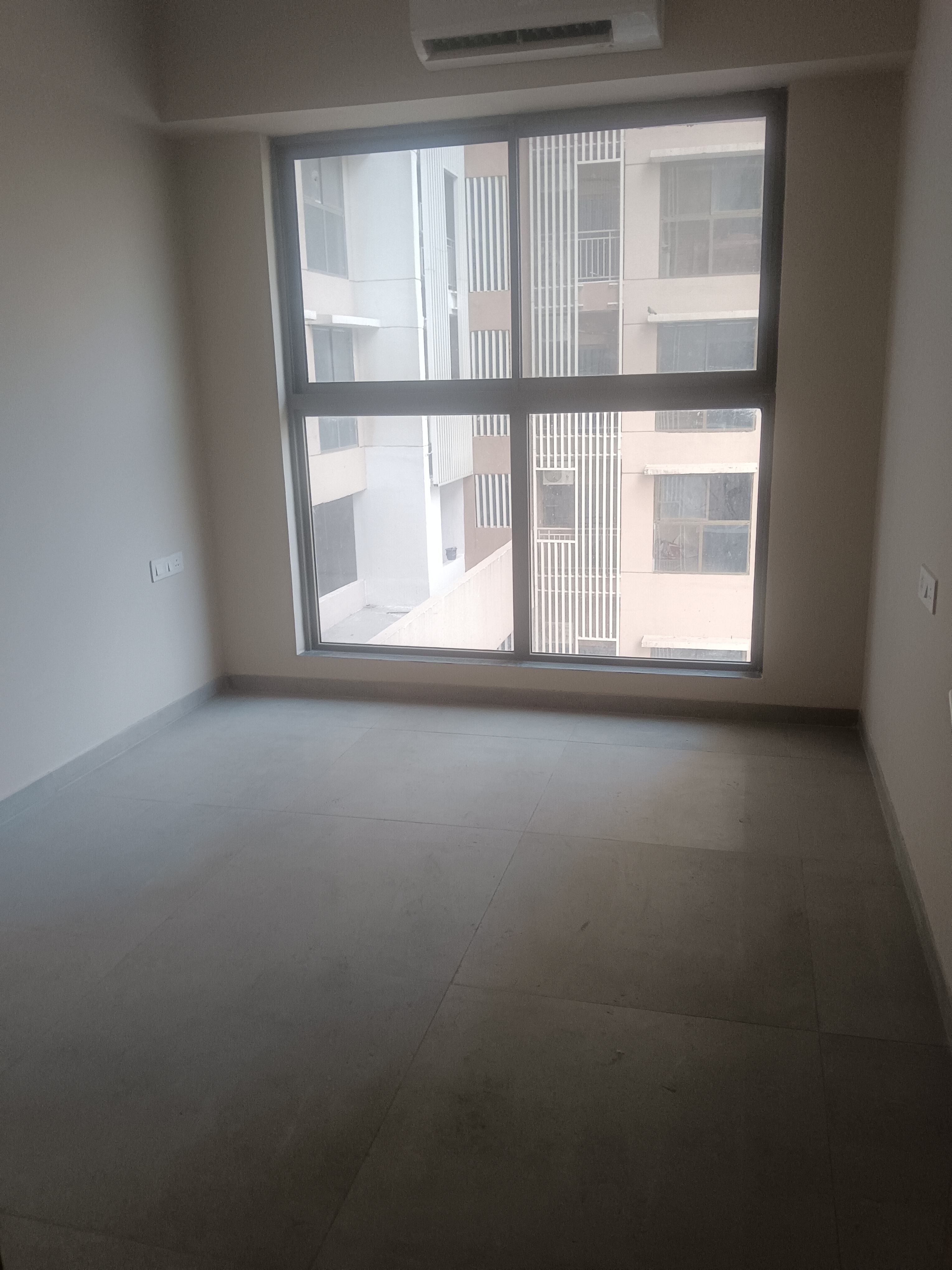 1.5 BHK + Extra Room 612 Sq.Ft. Apartment in Ajmera Crosstown One