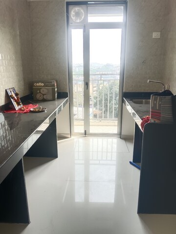 Kitchen in 1.5 BHK Apartment at Ajmera Crosstown One, Kalyan West – for Rent