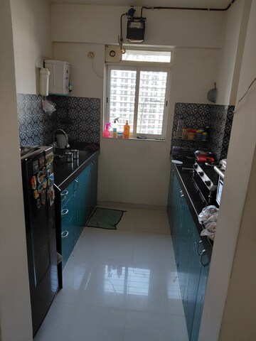 Team Area in 1 BHK Apartment at Lodha Amara, Kolshet Road – for Rent