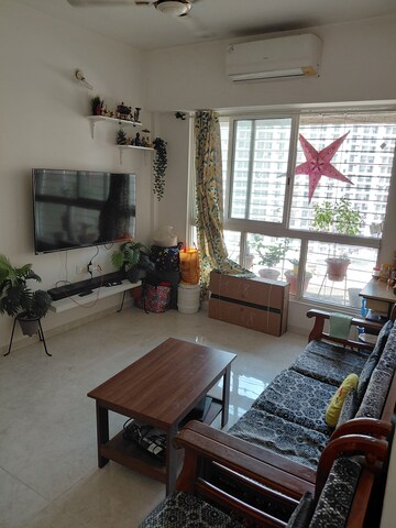 Living Room in 1 BHK Apartment at Lodha Amara, Kolshet Road – for Rent