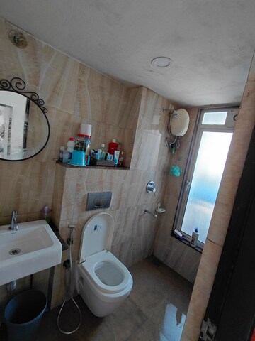 Bathroom in 1 BHK Apartment at Lodha Amara, Kolshet Road – for Rent