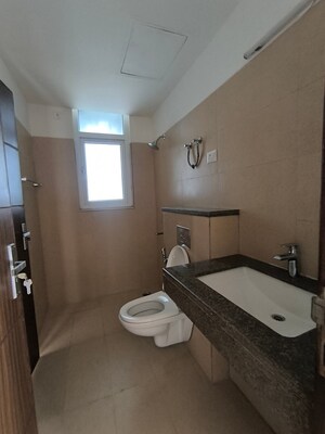 Bathroom in 3 BHK Apartment at Puri Diplomatic Greens Phase I, Sector 111 – for Sale