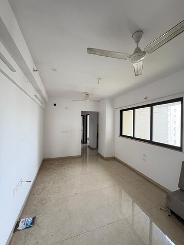 Living Room in 2 BHK Apartment at Lodha Palava Downtown Dombivli East, Dombivli East – for Sale