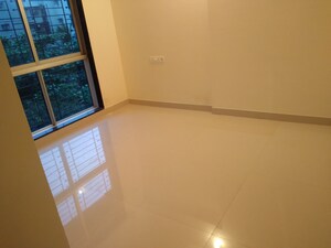 Room in 1 BHK Apartment at Ajmera Boulevard, Malad West – for Rent