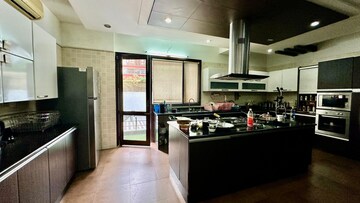 Kitchen in 4 BHK Apartment at Mahindra Luminare, Sector 59 – for Sale