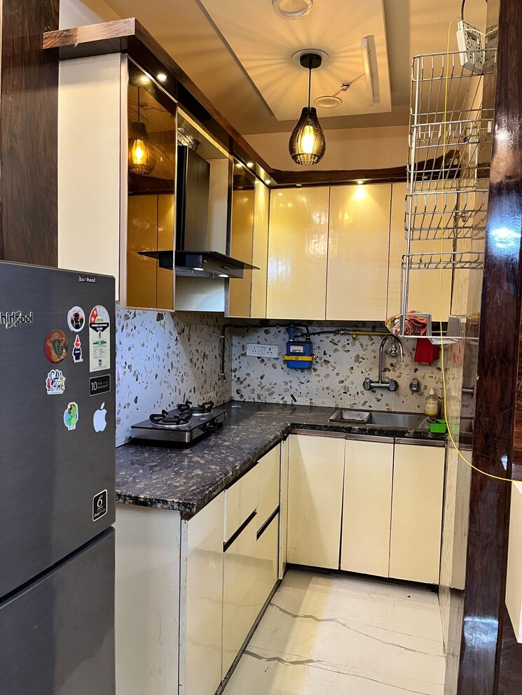 Kitchen, dwarka mor 2 Bedroom 57 Sq.Yd. Builder Floor In Dwarka Mor Delhi 9534442