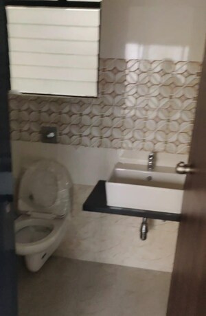 Bathroom in 2 BHK Apartment at Roshan Milestone, Tathawade – for Rent
