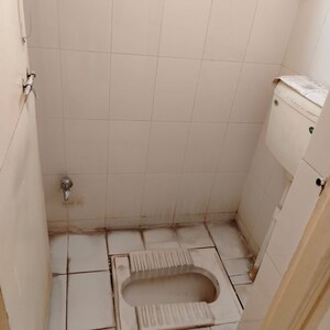 Bathroom in 1 BHK Apartment at Vardhaman Township, Hadapsar – for Rent