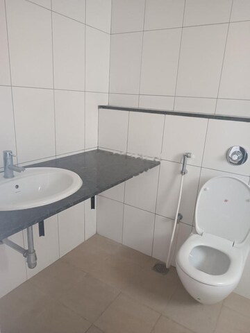 Bathroom in 2 BHK Apartment at Godrej Aqua, International Airport Road – for Rent