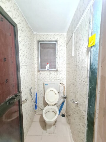 Bathroom in 1 BHK Apartment at Om CHS Kandivali, Kandivali West – for Rent