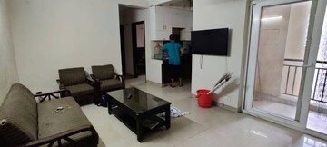 Living Room in 2 BHK Apartment at Paramount Floraville, Sector 137 – for Sale