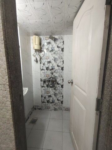 Bathroom in 1 BHK Apartment at Himgiri Lokupvan Phase II CHS Ltd, Vasant Vihar – for Rent