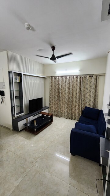 Living Room in 1 BHK Apartment at Lodha Amara, Kolshet Road – for Rent