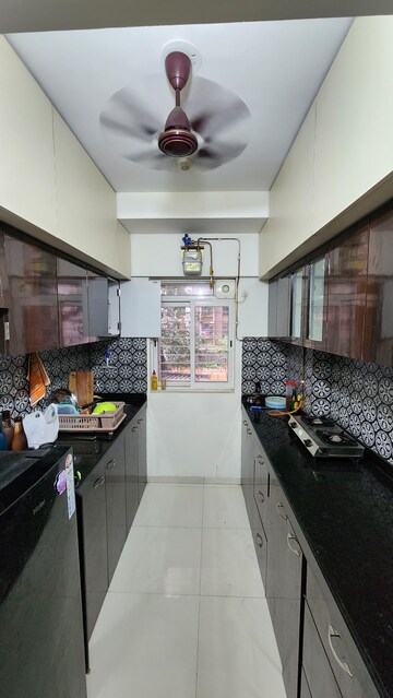 Kitchen in 1 BHK Apartment at Lodha Amara, Kolshet Road – for Sale