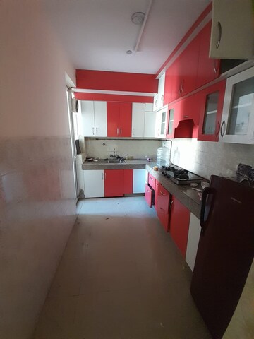 Kitchen in 2 BHK Apartment at Sikka Karnam Greens, Sector 143b – for Rent