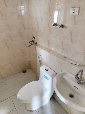 Bathroom in 2 BHK Apartment at Sikka Karnam Greens, Sector 143b – for Rent