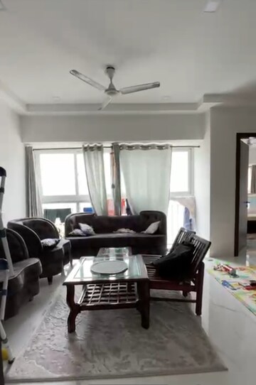 Living Room in 2 BHK Apartment at Ruparel Ariana, Parel – for Rent
