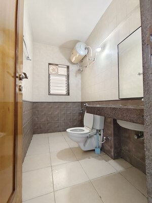 Bathroom in 3 BHK Apartment at Silver Leaf II, Shivajinagar – for Rent