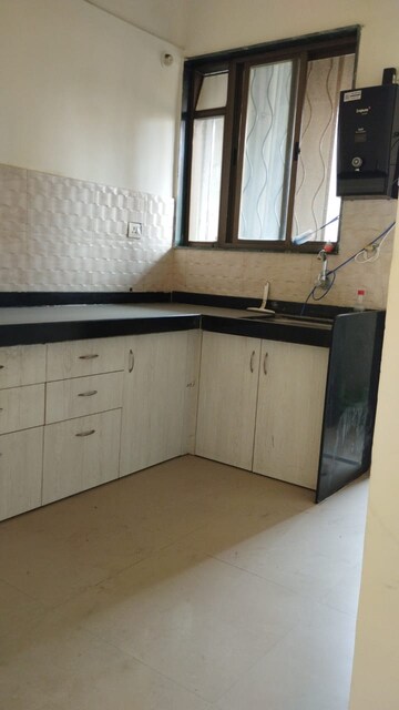 Kitchen in 2 BHK Apartment at Kumar Urban Kul Ecoloch, Mahalunge – for Rent