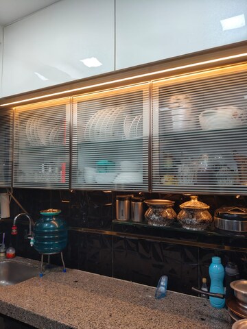 Kitchen in 2 BHK Apartment at Raunak Unnathi Woods Phase 6, Ghodbunder Road – for Sale